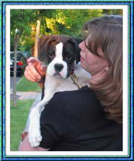 Kira at 4 months and her new owner Sarita Kelty.